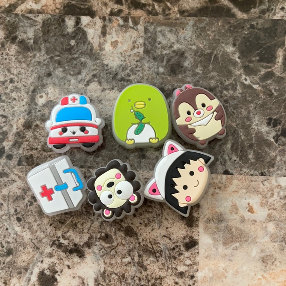 Crocs jibbits glow in dark